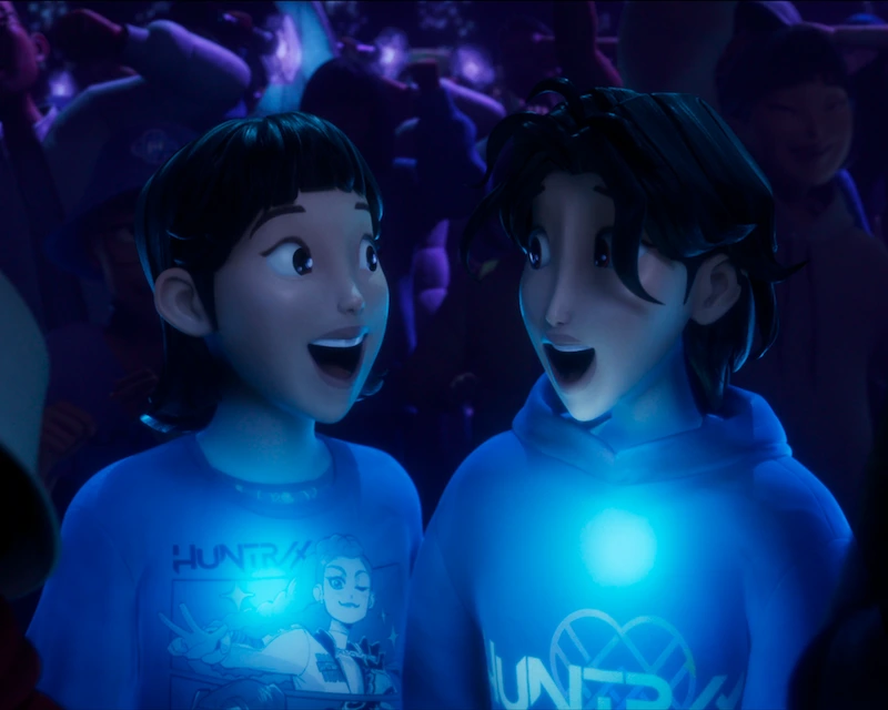 Fans in the Huntrix concert crowd