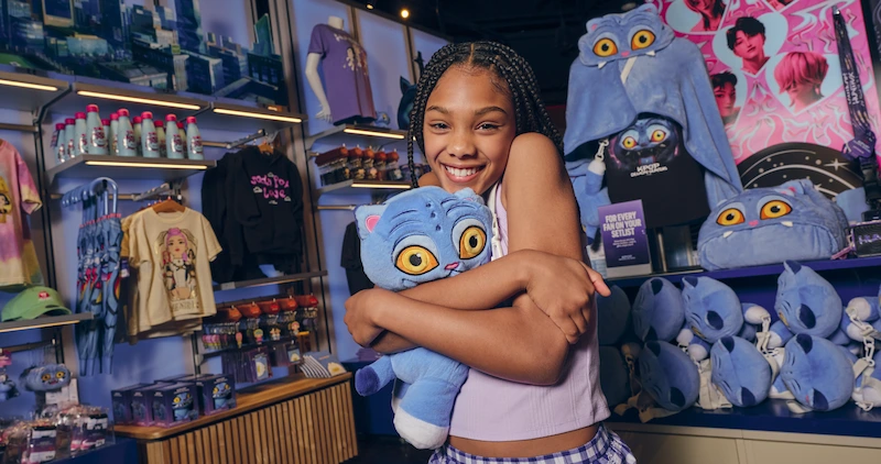 Girl holding Derpy in Netflix House Retail