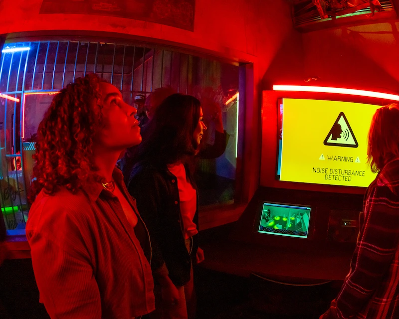 Group playing games in RePLAY