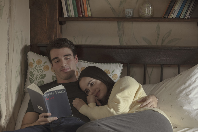 Corey Mylchreest as Jamie and Sofia Carson as Anna reading together in 'My Oxford Year'.