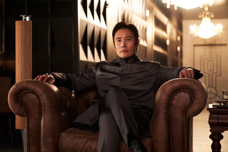 Lee Byung-hun as Front Man sits in a chair in 'Squid Game' Season 2 