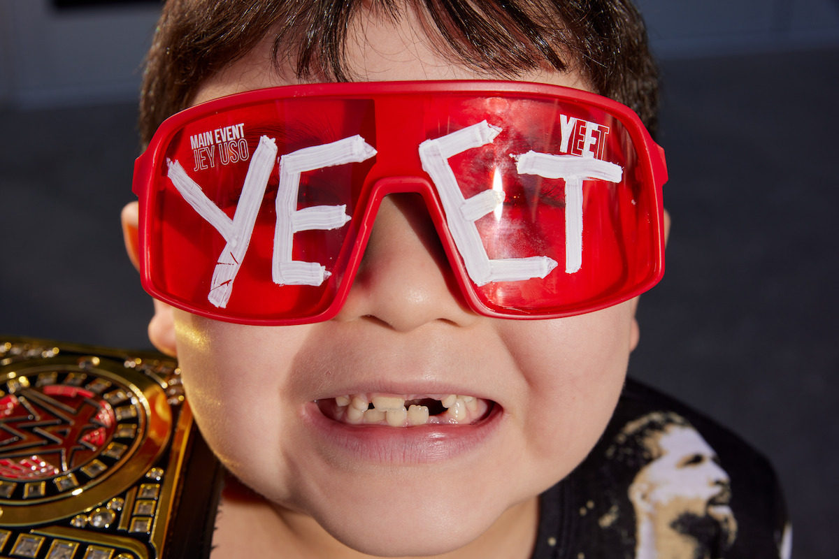 A fan wearing YEET glasses at Netflix's LA Premiere of WWE Monday Night RAW at Intuit Dome on January 6, 2025 in Inglewood, California