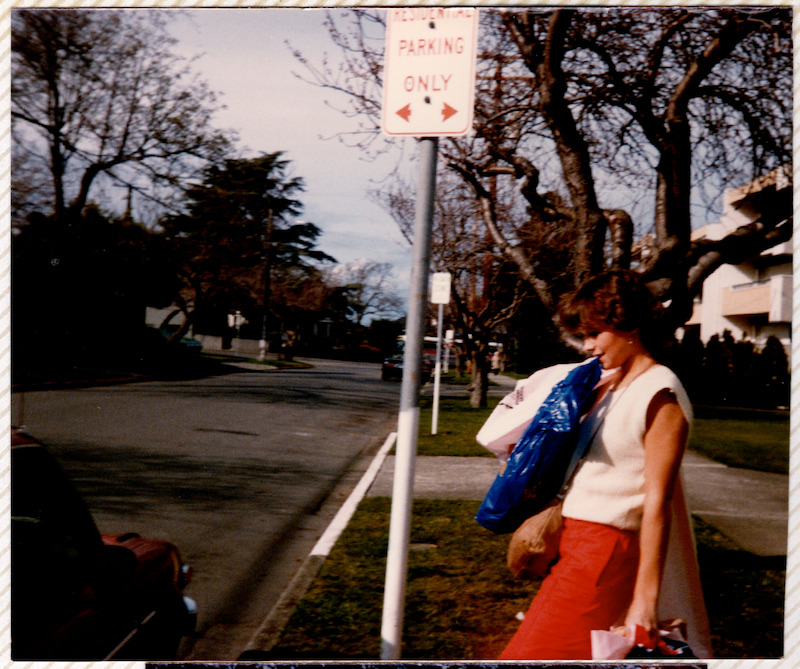 Pamela standing on the sidewalk.