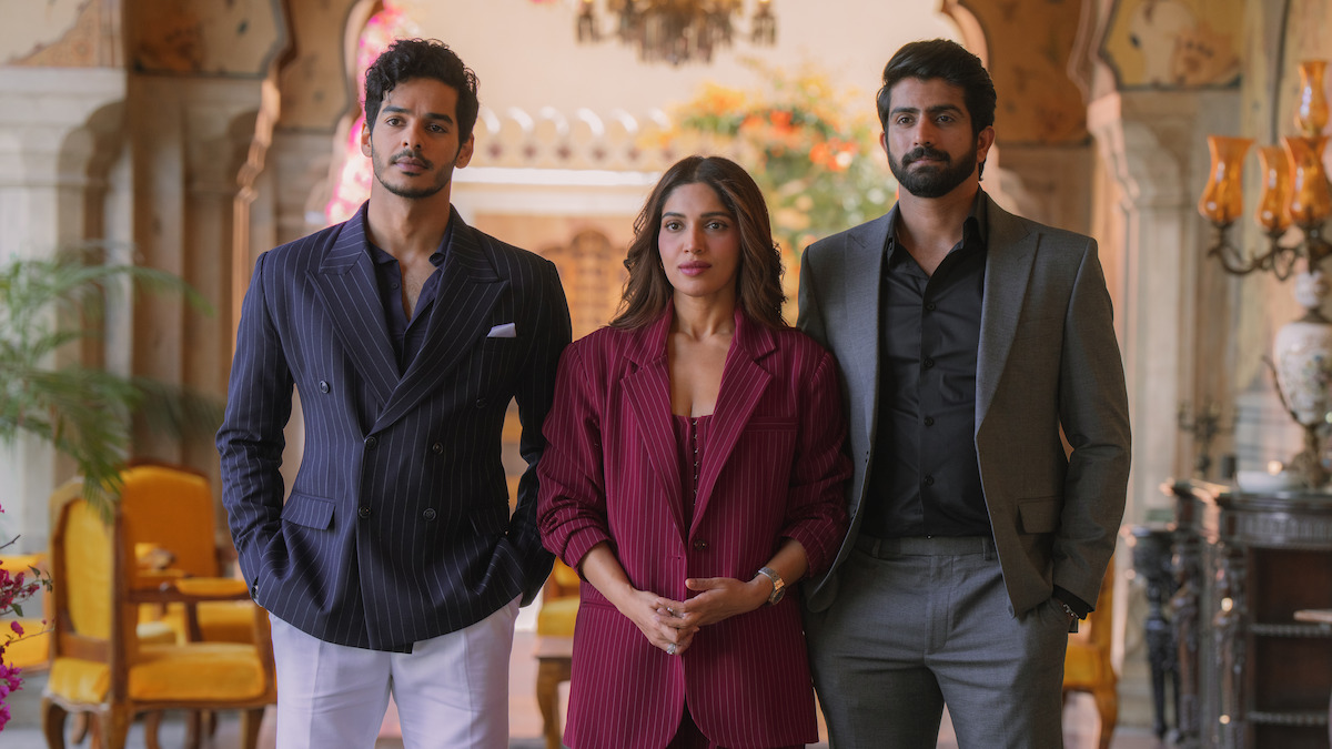 Ishaan Khatter as Aviraaj Singh, Bhumi Pednekar as Sophia Shekhar, and Udit Arora as Kunal Mehta stand in a row in an image from ‘The Royals.’