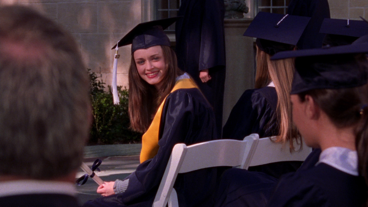 A teen at her high school graduation