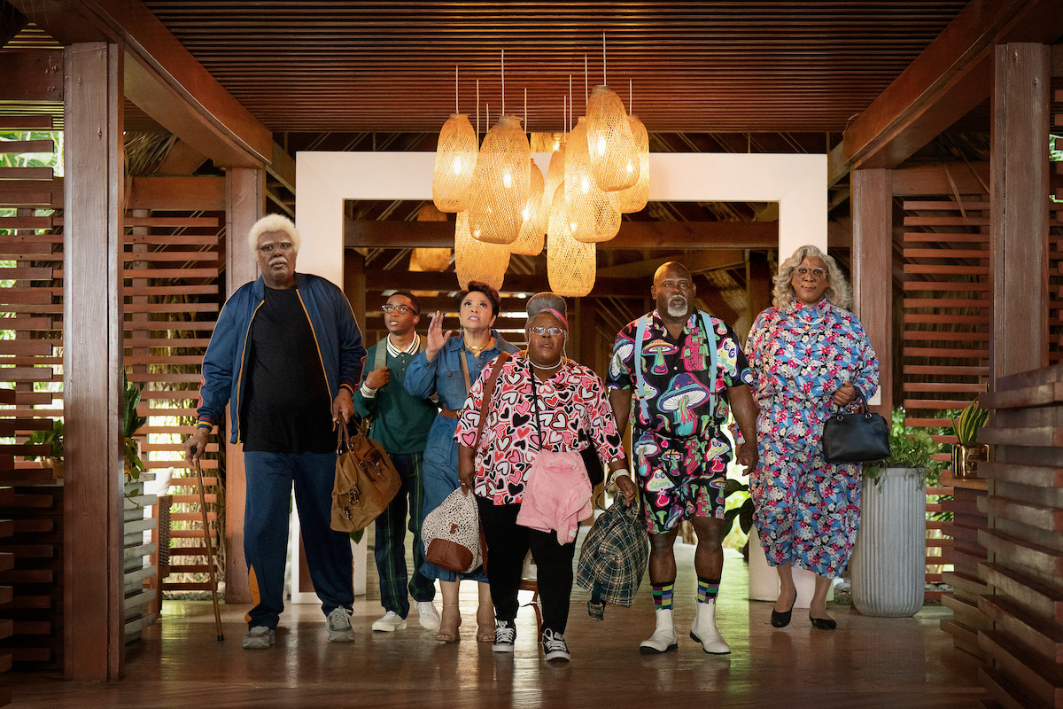 The cast of Madea's Destination Wedding through a resort