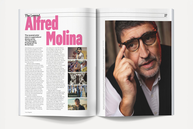 Magazine spread featuring an article about Alfred Molina with text and several smaller images on the left page, and a large portrait of Alfred Molina indoors wearing glasses and a vest on the right page.