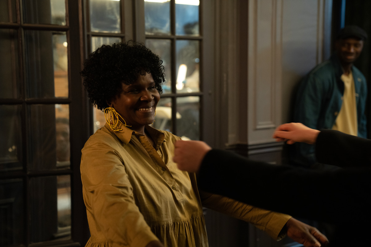 Naky Sy Savané as Mariama smiles in Season 3 of ‘Lupin.’