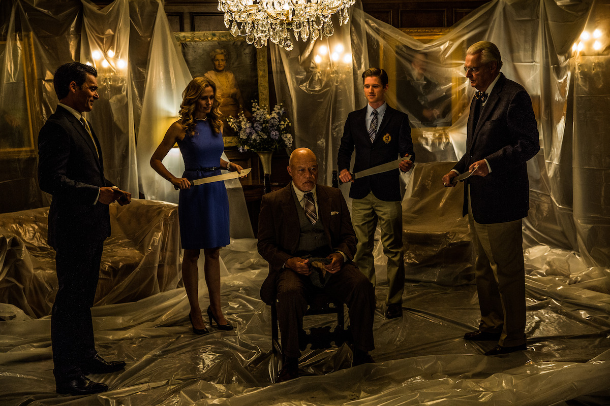 John Beasley as Papa Rico sits in the home of a wealthy family waiting to be sacrificed in ‘The Purge: Anarchy.’