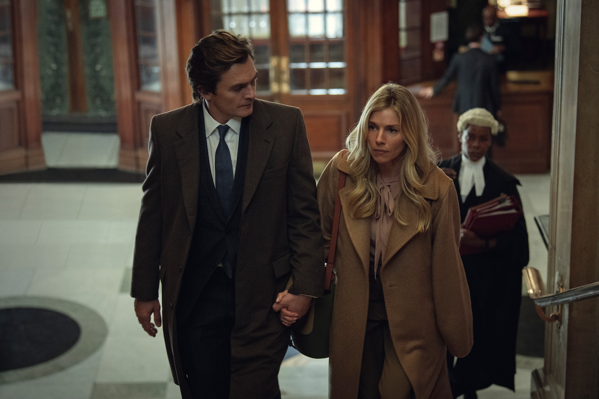 James (Rupert Friend) and Sophie Whitehouse (Sienna Miller) arrive in court in Anatomy of a Scandal.