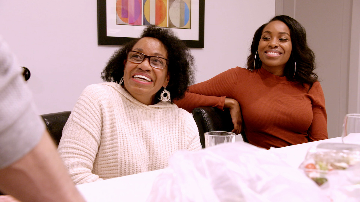 Lauren and her mother sitting at a table.