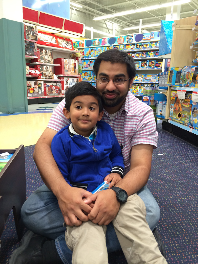 Aziz with his dad at toy store in Atlanta, GA, December, 2014.