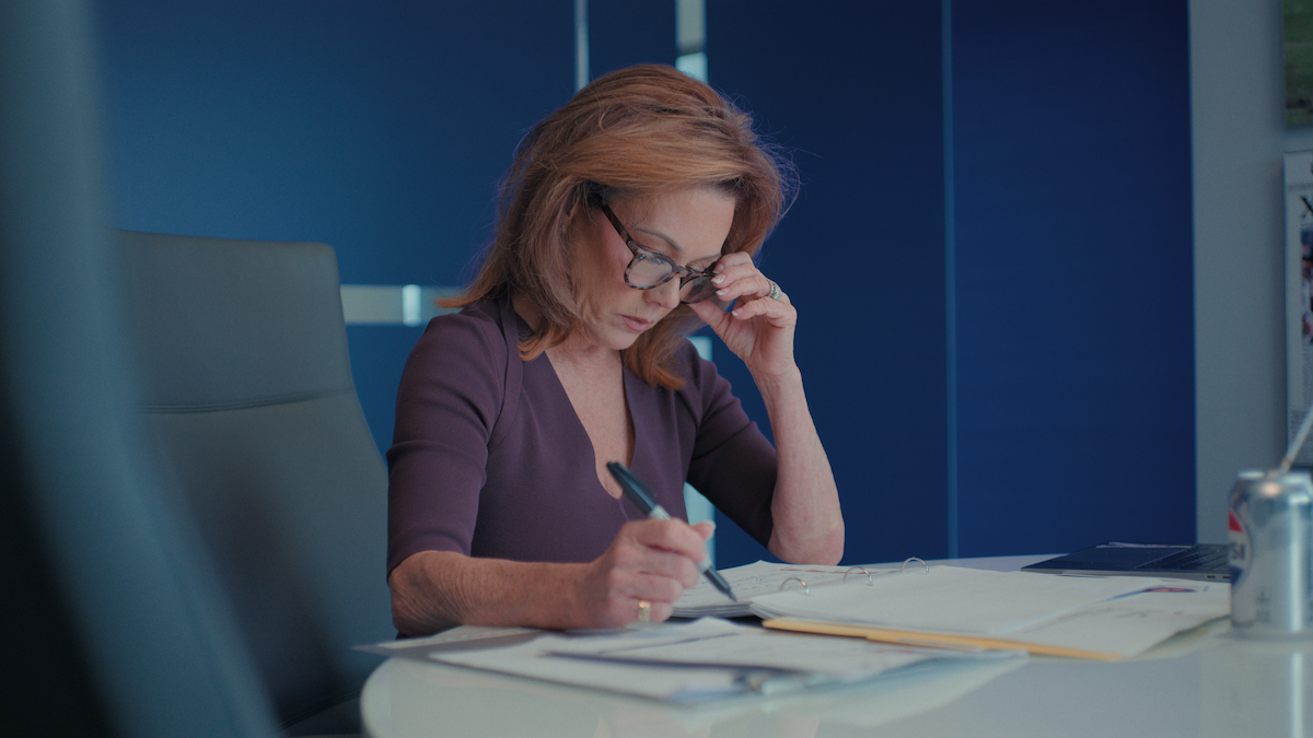 Dallas Cowboys Cheerleaders huddled together.