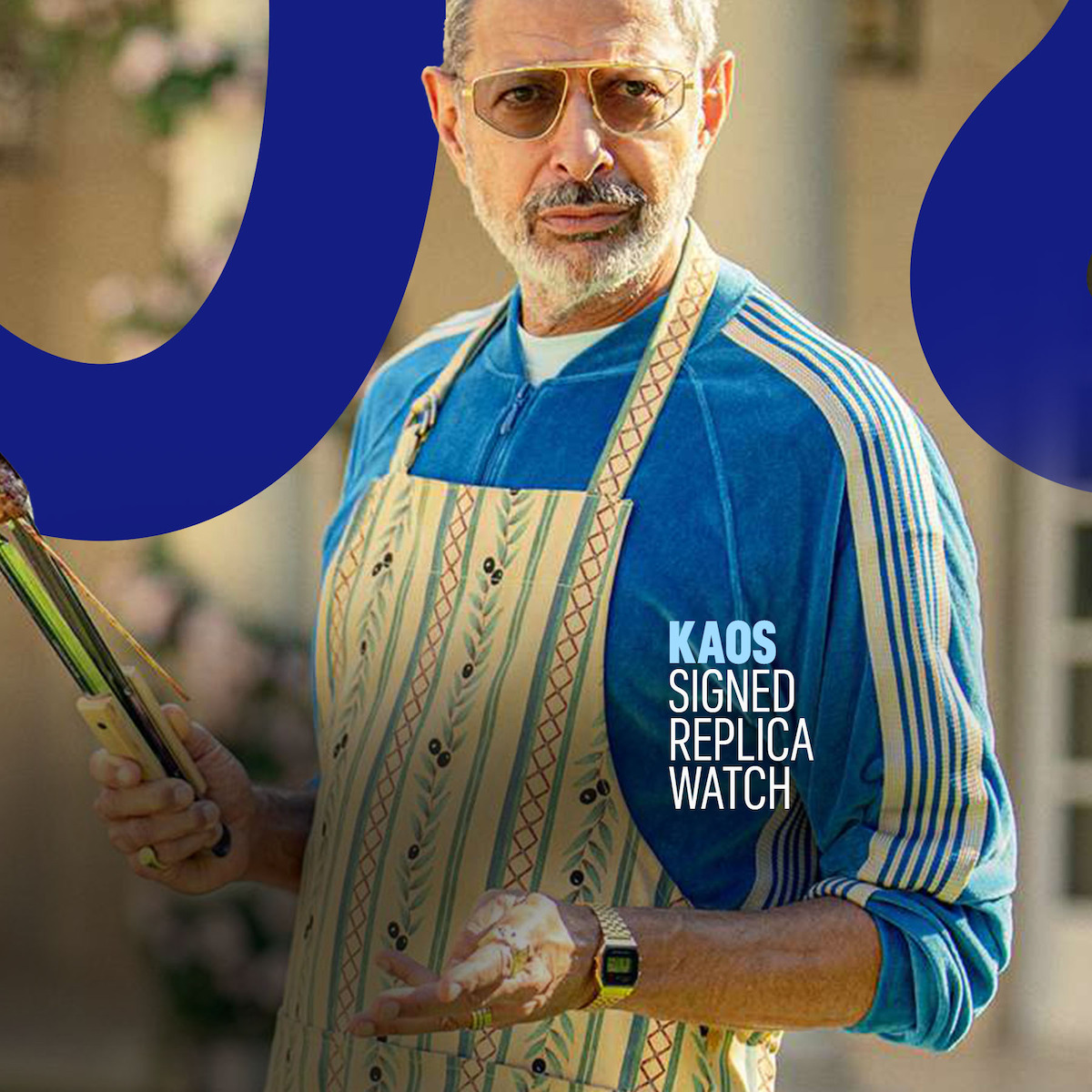 Jeff Goldblum wears an apron and gold watch in Season 1 of ‘Kaos’