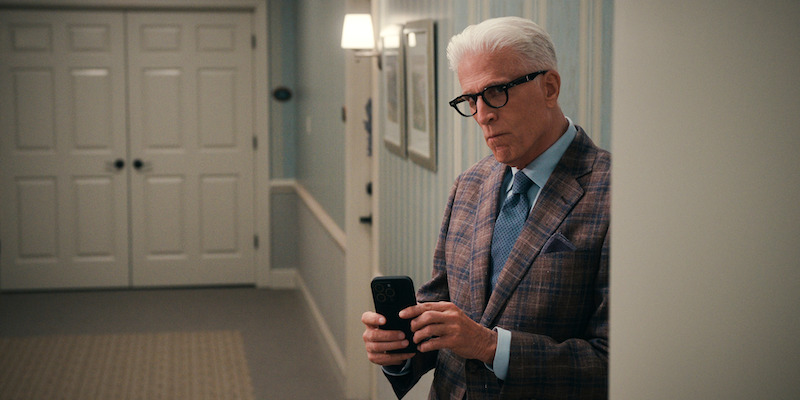 Ted Danson as Charles subtly takes a photo on his phone in Season 1 of 'A Man on the Inside'