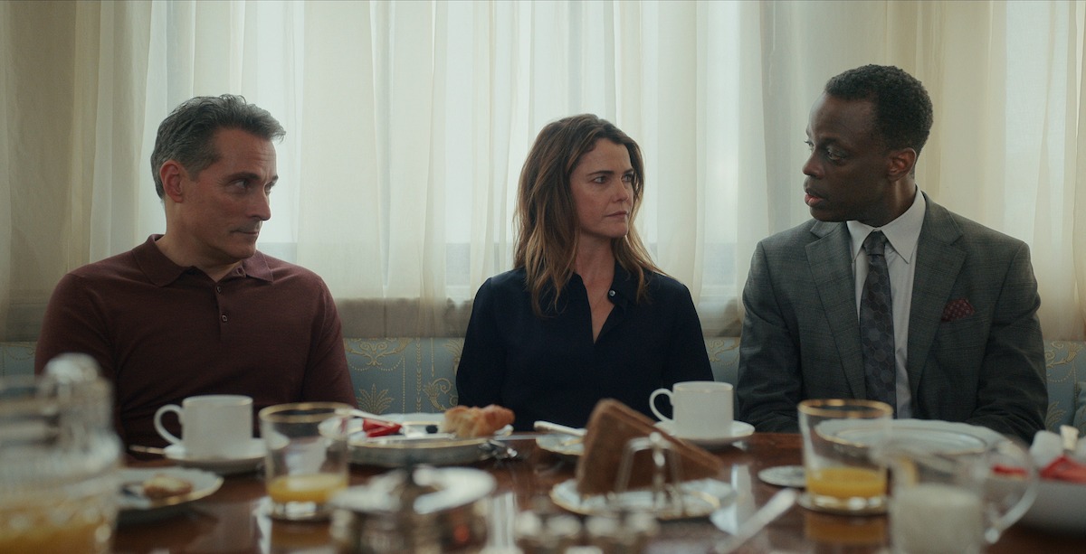 Rufus Sewell as Hal Wyler, Keri Russell as Kate Wyler, and Ato Essandoh as Stuart Hayford in ‘The Diplomat’ Season 2, Episode 6.