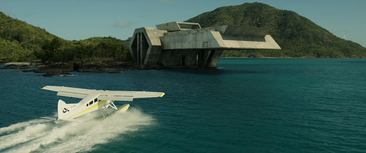 Abnesti arrives at the facility in a de Havilland plane - The Beauty of Brutalism: the Design References in ‘Spiderhead’ Revealed