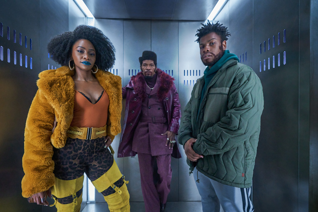 Teyonah Parris as Yo-Yo, Jamix Foxx as Slick Charles, John Boyega as Fontaine in They Cloned Tyrone