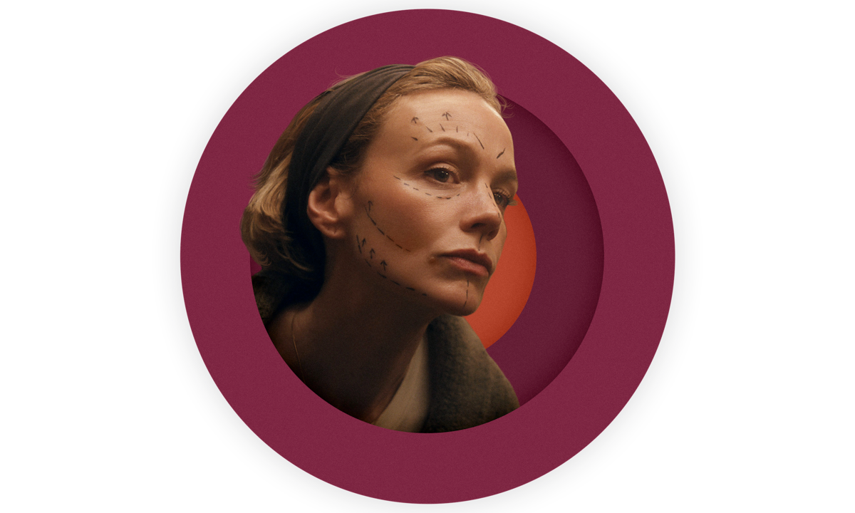 A spot photo illustration of Carey Mulligan as Lindsay with markings on her face to show what cosmetic surgeries she could potentially pursue with the team at the Trochos Clinic in Korea.
