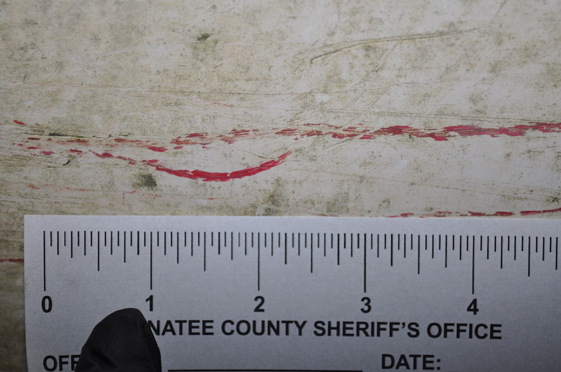 Several fresh, unexplained red paint smudges found on Pat’s Stumpnocker