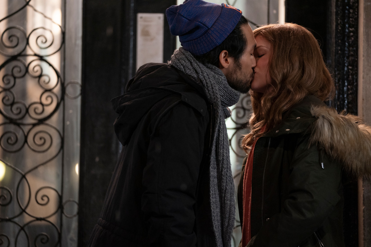 Augie (Jin Ha) and Darby (Anna Kendrick) kiss in ‘Love Life’ Season 1.