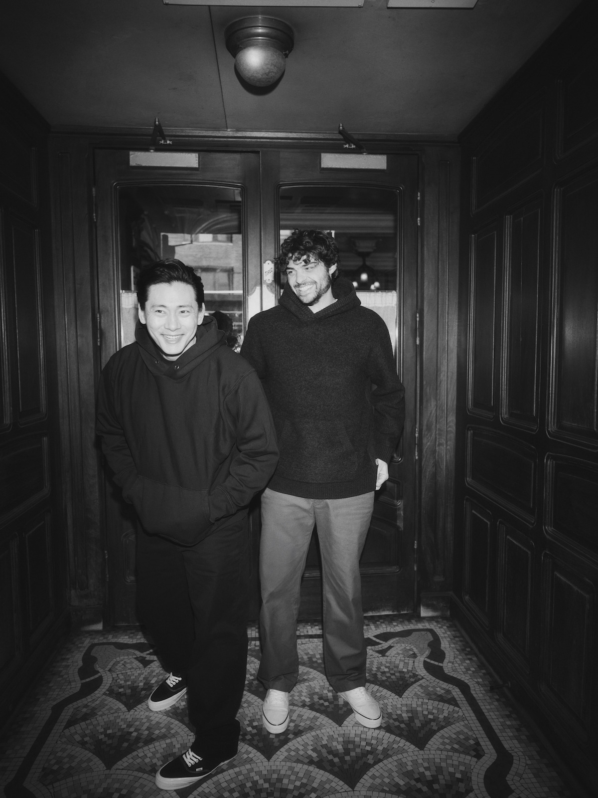 Teo Yoo and Noah Centineo walk into a restaurant.