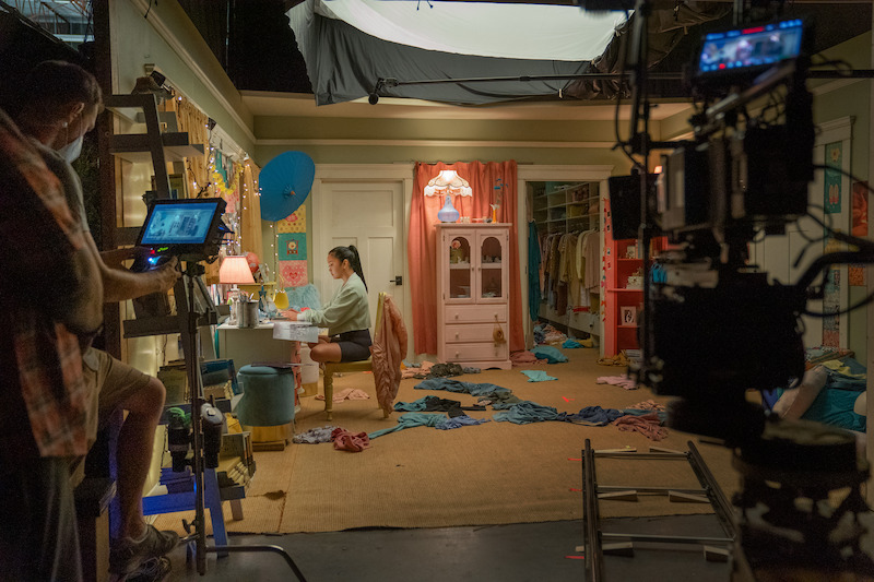 Lana Condor as Lara Jean in her bedroom.