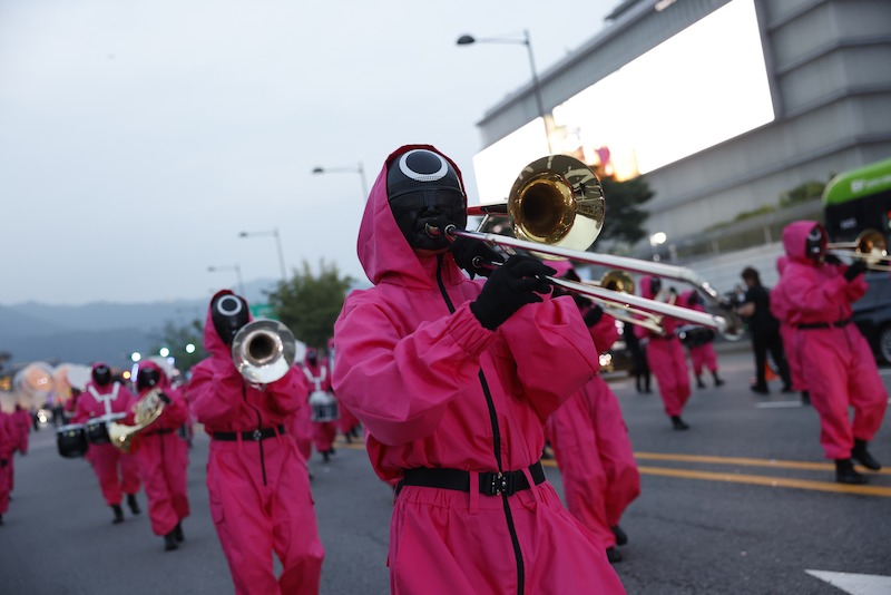 A Pink Guard band performance at the 'Squid Game' Season 3 parade in Seoul. 