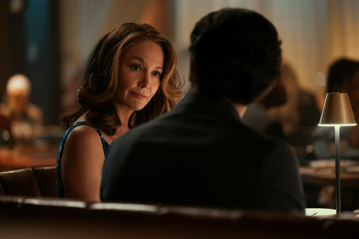 Diane Lane as Martha Croker dines at a restaurant in ‘A Man in Full’