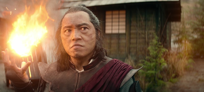 Ken Leung as Zhao holds a ball of fire in season 1 of 'Avatar: The Last Airbender'