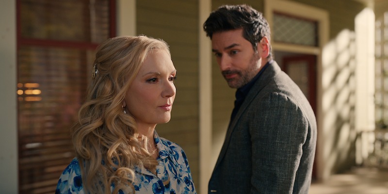 Teryl Rothery as Muriel St. Claire and Mark Ghanimz talk together on a porch in Season 6 of 'Virgin River'