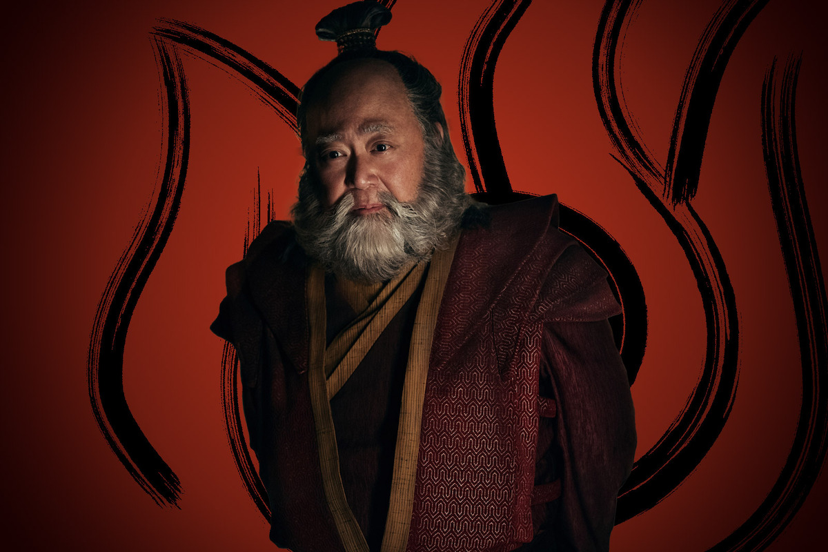 Paul Sun-Hyung as Uncle Iroh wears a red cloak in season 1 of ‘Avatar: The Last Airbender’