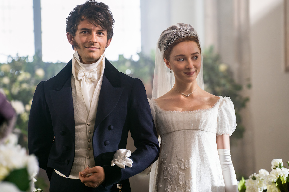 Anthony (Jonathan Bailey) walks Daphne (Phoebe Dynevor) down the aisle in ‘Bridgerton.’