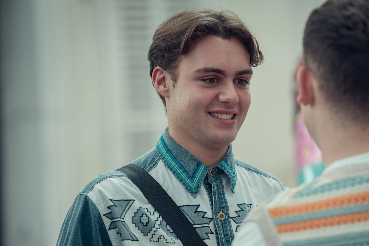 Bradley Riches as James smiles in Season 2 of ‘Heartstopper.’