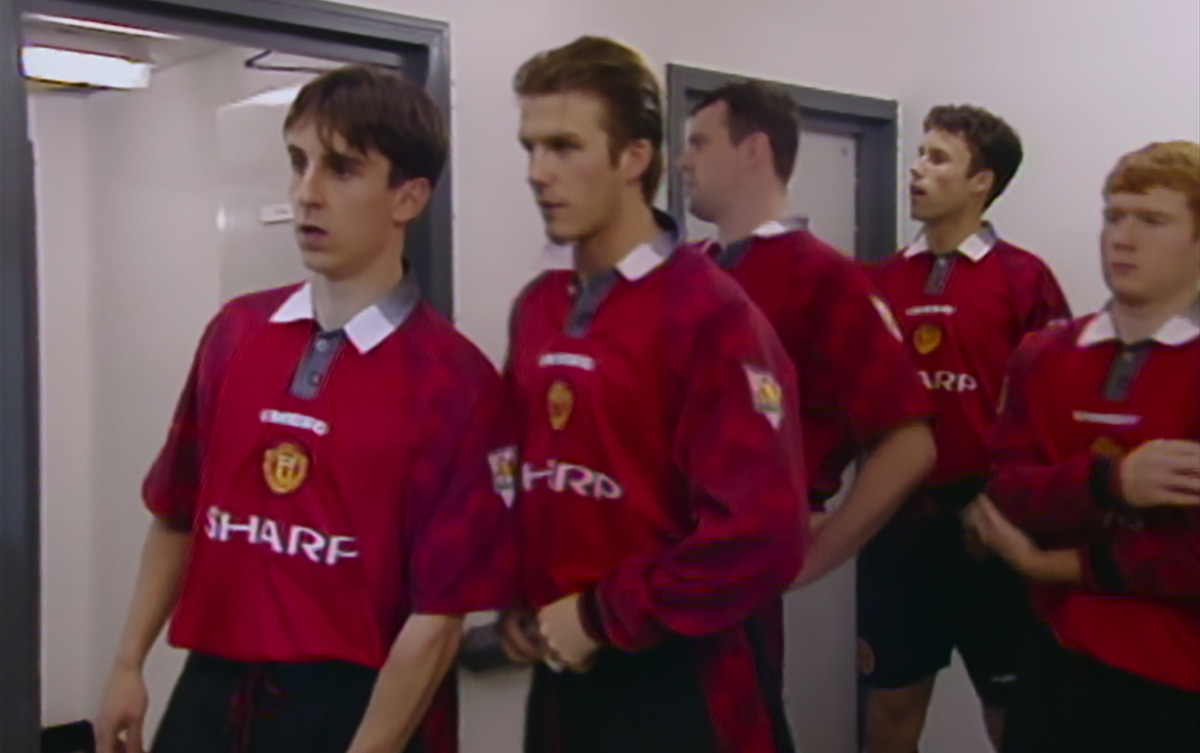 Gary Neville, David Beckham, and Paul Scholes in the tunnel prior to a match.