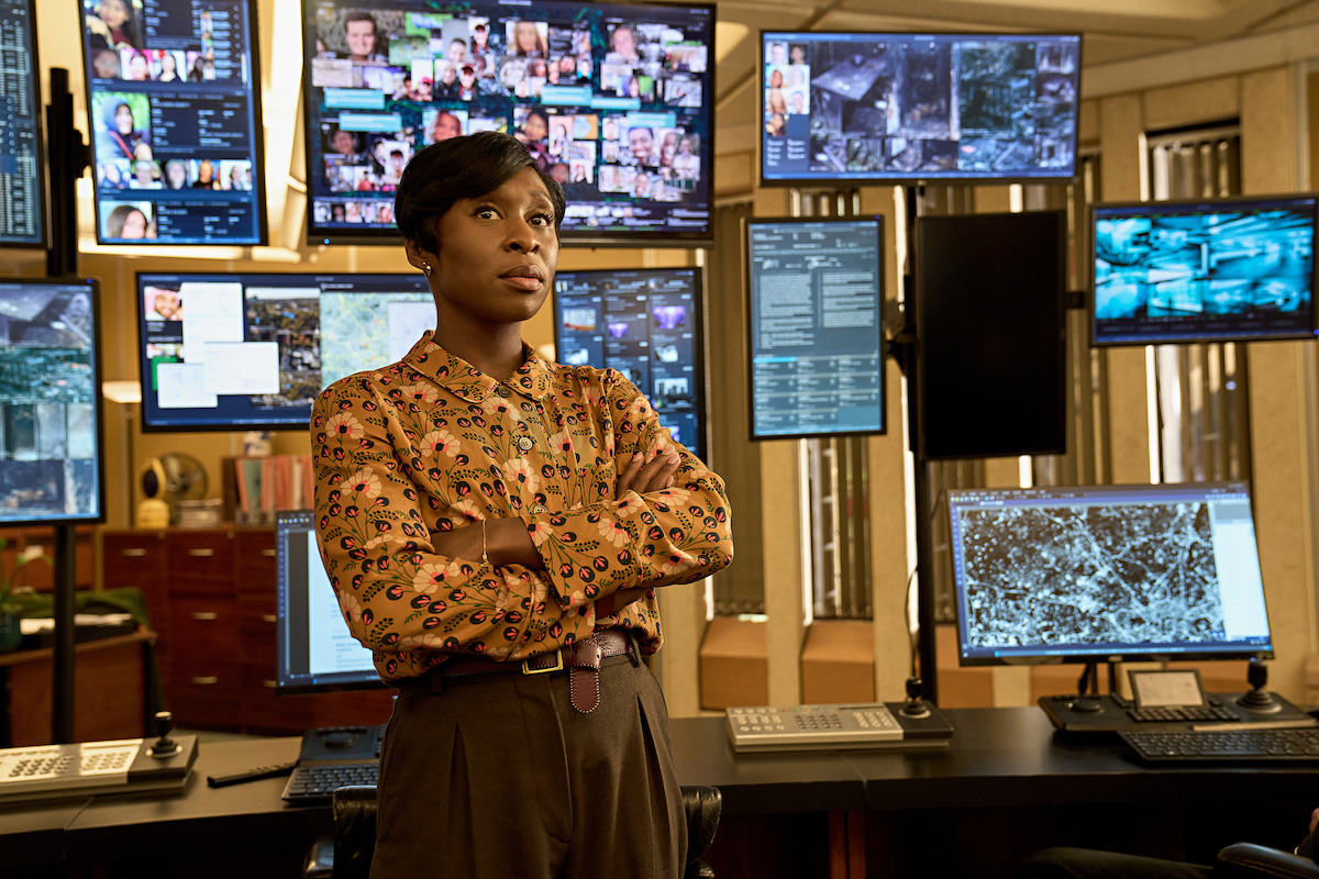 Cynthia Erivo stands with her arms crossed in front of several monitors in 'Luther: The Fallen Sun.'