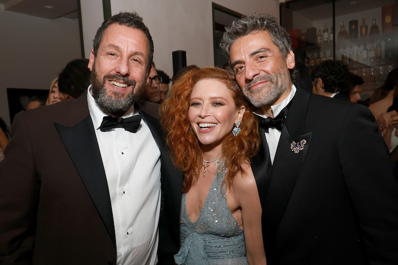 Adam Sandler, Natasha Lyonne, and Oscar Isaac pose for a photo.