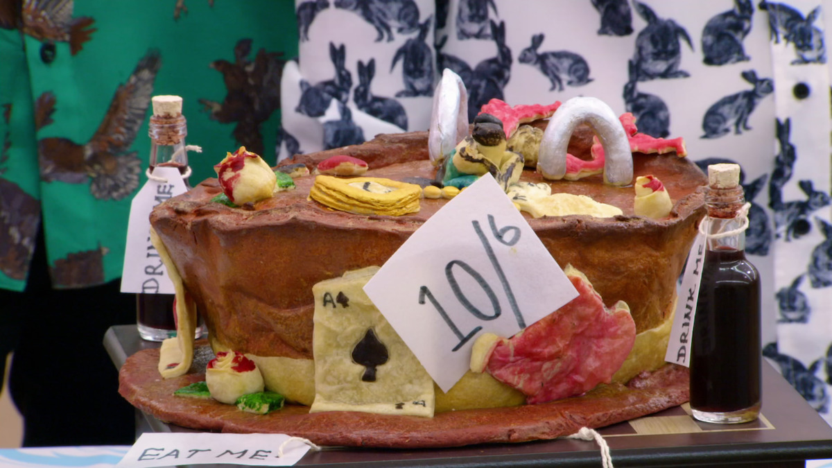 A sweet potato pie with decorative croquet pieces on top to fit with the Mad Hatter theme