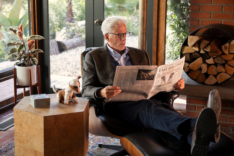 Ted Danson as Charles sits and reads a newspaper in Season 1 of 'A Man on the Inside'