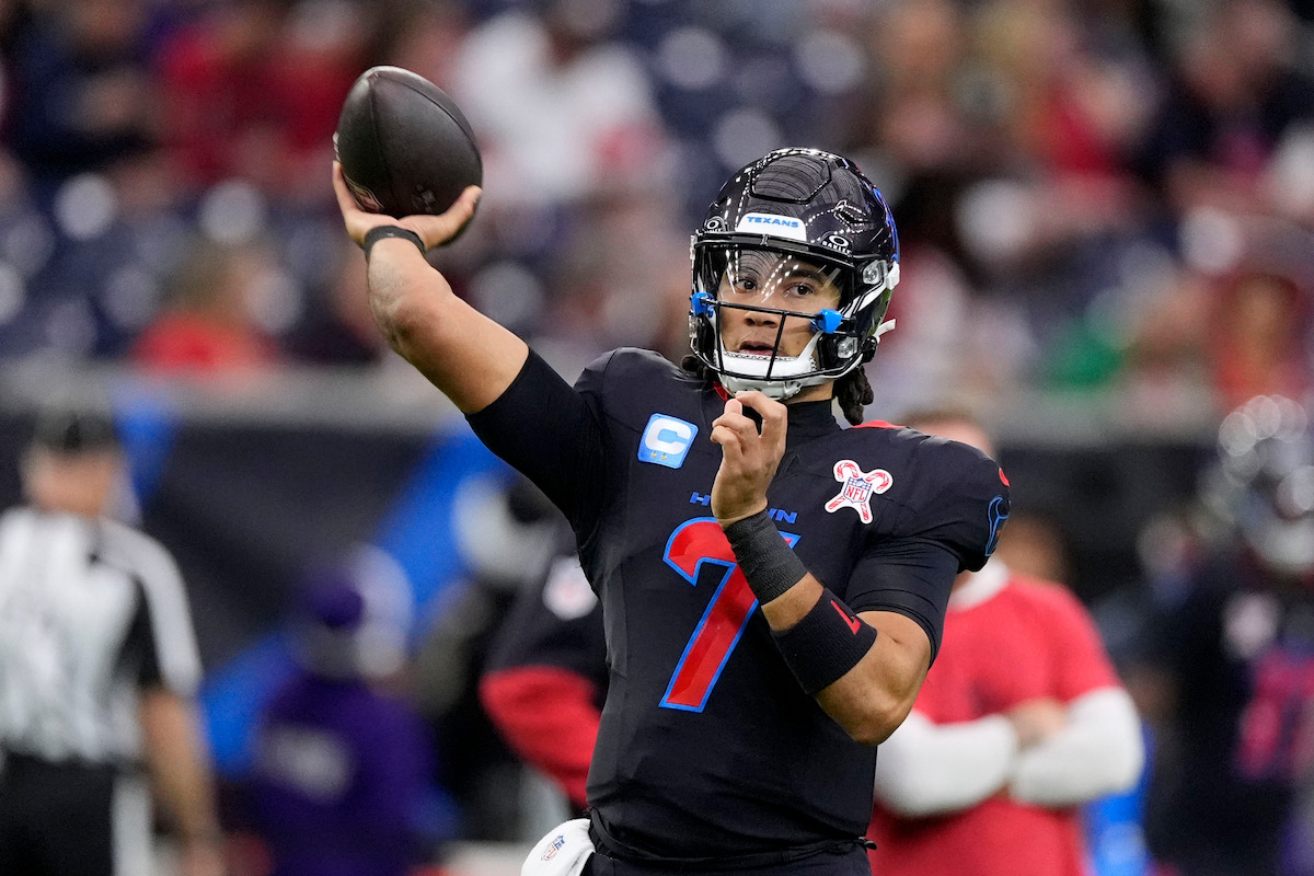 Houston Texans quarterback C.J. Stroud warms up before an NFL football game against the Baltimore Ravens, Wednesday, Dec. 25, 2024, in Houston.