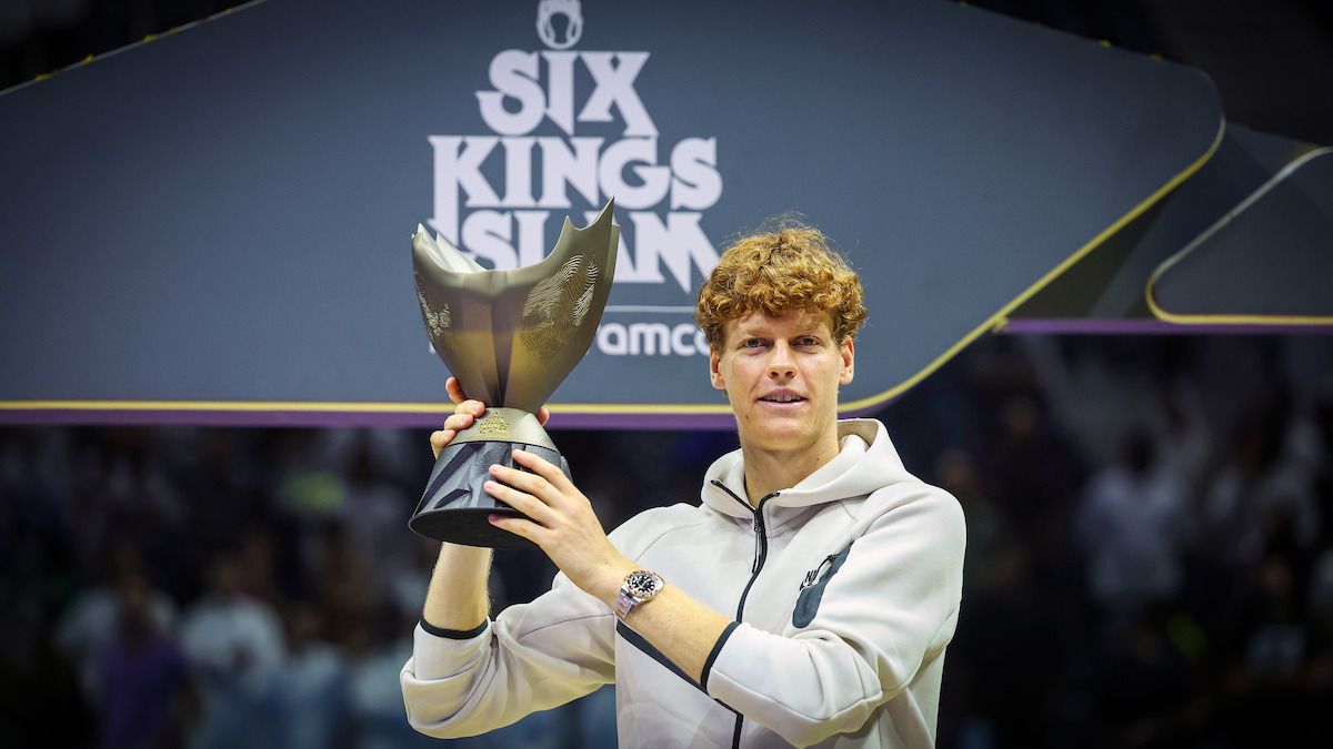 Jannik Sinner of Italy poses for a photo with the trophy following victory in his Men's Singles Final match against Carlos Alcaraz.
