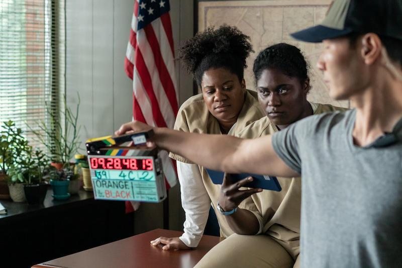 (L to R) Adrienne C. Moore as Cindy, Danielle Brooks as Tasha "Taystee" on the set of Orange Is The New Black Season 5.