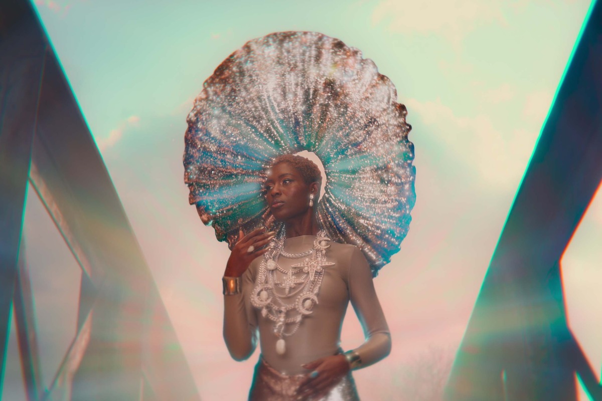 Jodie Turner-Smith as God appears on a bridge in Season 4 of ‘Sex Education.’