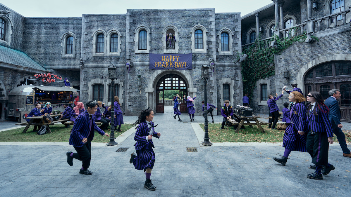 Students in the Nevermore Academy courtyard in ‘Wednesday’ Season 2.