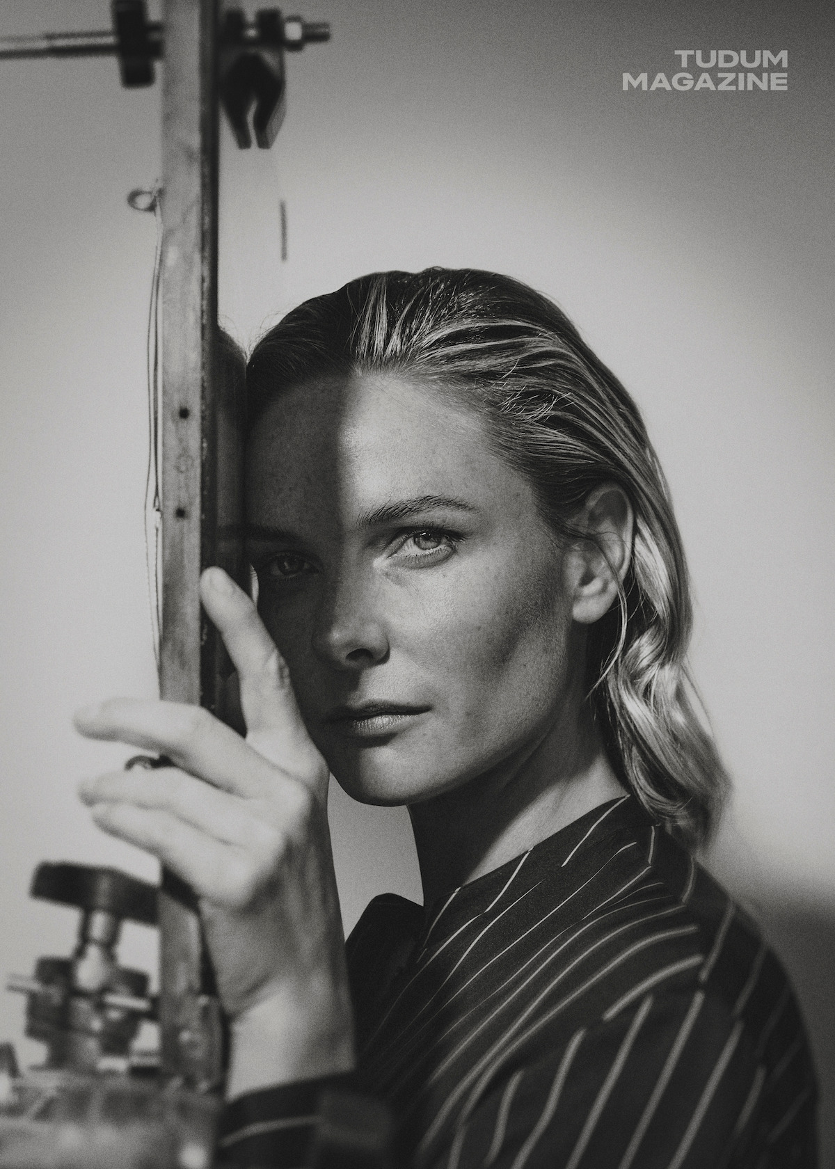 Rebecca Ferguson wearing a pin stripe blazer.