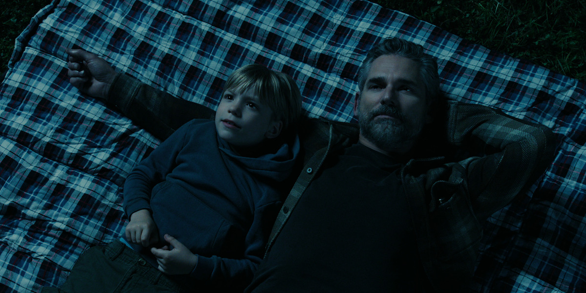 Ezra Wilson as Caleb Turner and Eric Bana as Kyle Turner in ‘UNTAMED.’