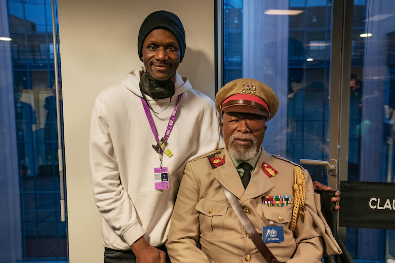 Axel Nyam and John Kani as Colonel Ulenga.