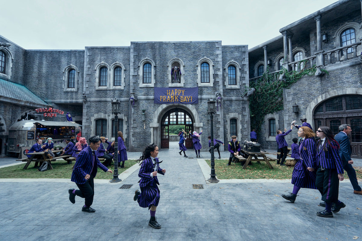 Students in the Nevermore Academy courtyard in ‘Wednesday’ Season 2.