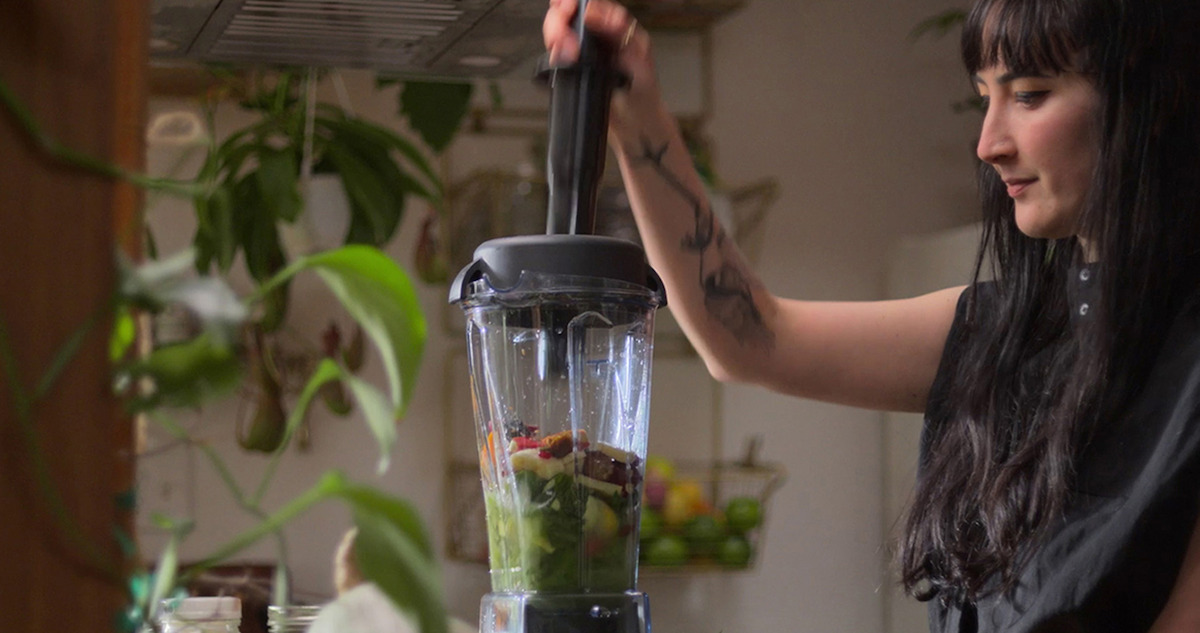 Maya Okada Erickson using a blender in ‘Hack Your Health: The Secrets of Your Gut’