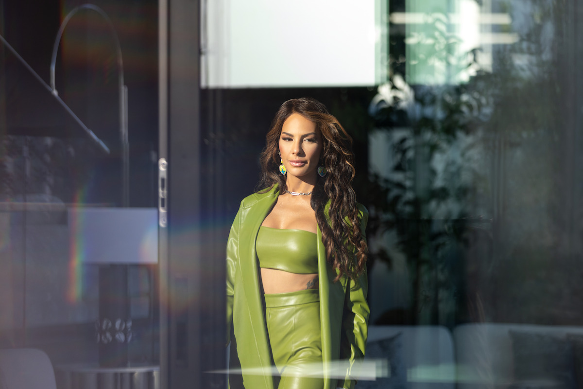 Amanza looks out the window. 